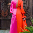 Load image into Gallery viewer, A bright two-tone pink and orange maxi dress