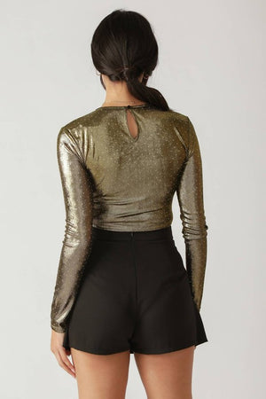 Gold bodysuit featuring round neckline